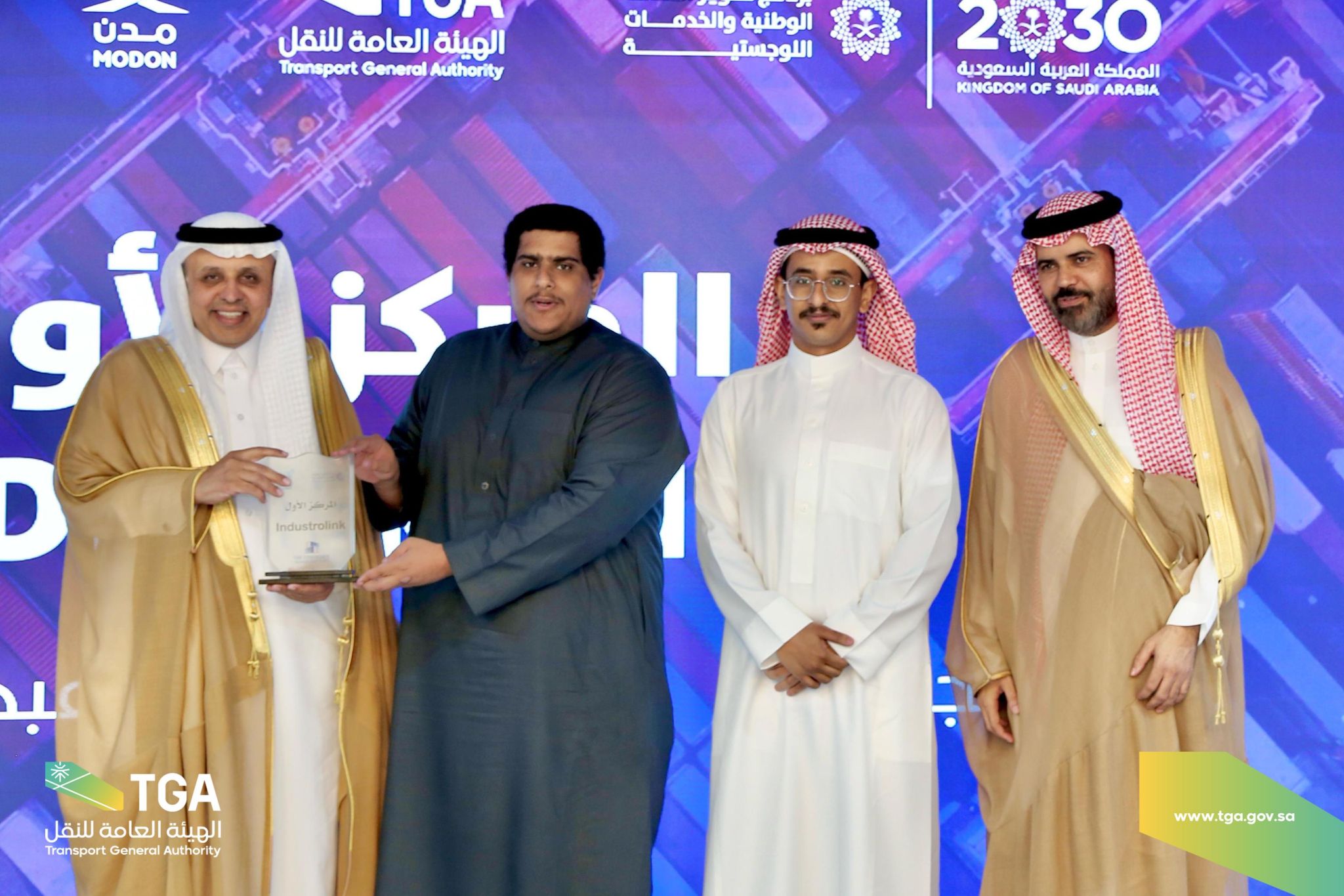 Abdulaziz Aldharrab and Faisal Aljohani at the first-place award presentation for IndustroLink